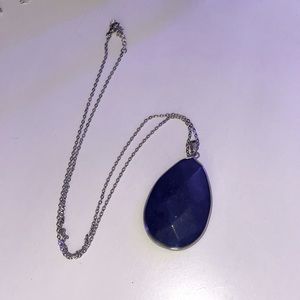 silver necklace with blue stone